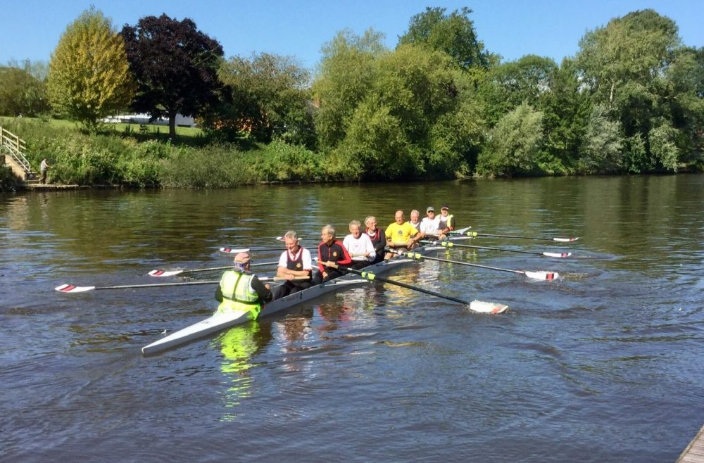 Bill Needham on 80th birthday rowing with friends