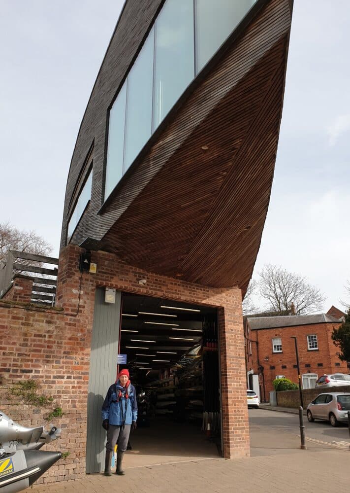 David Clark row outside the boathouse