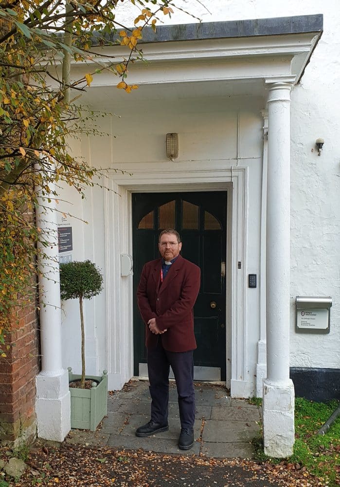 OV Roger Latham outside No 12 College Green