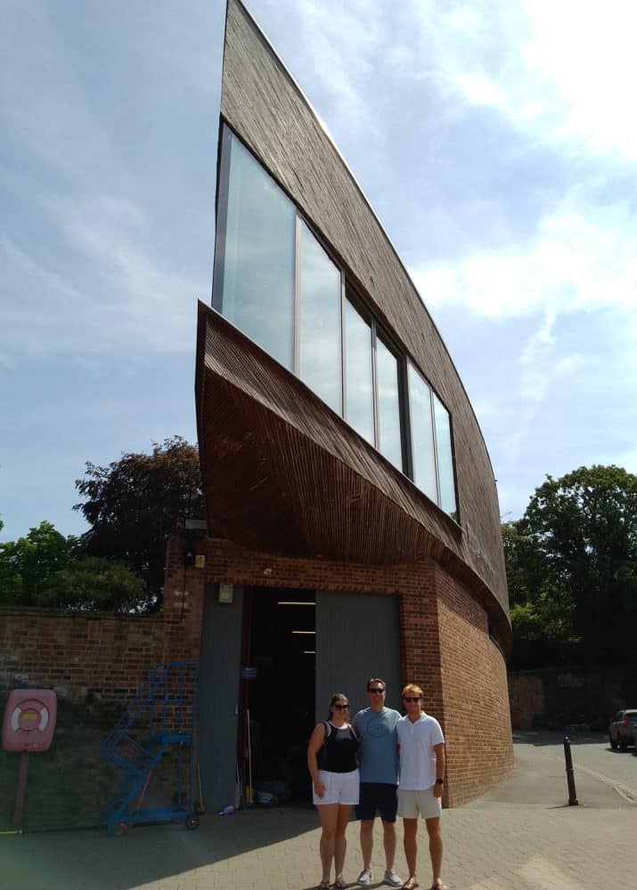 OV Rupert Thomas with his children outside the Michael Baker Boathouse